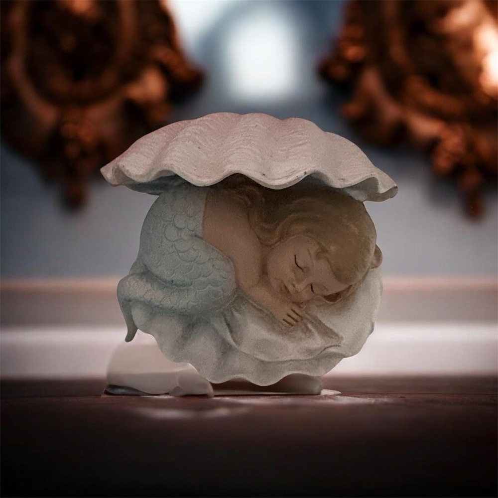 Ceramic Blue Mermaid Figurine in a White Shell